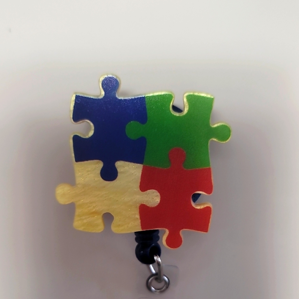 Puzzle Pieces Badge Reel